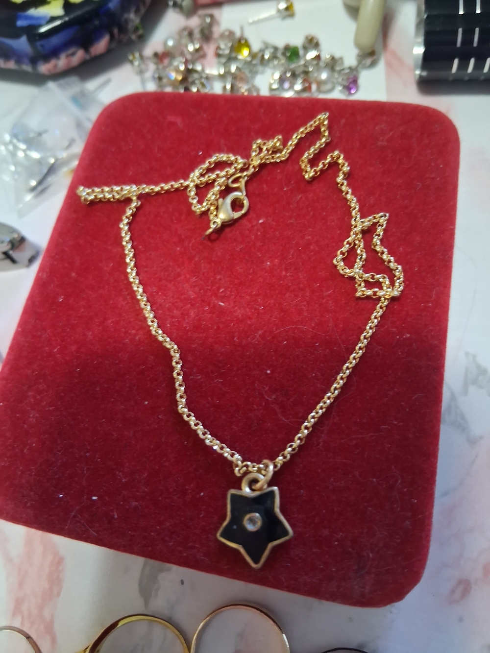 Source Unknown Gold Tone Star Pendant Necklace with Black Enamel